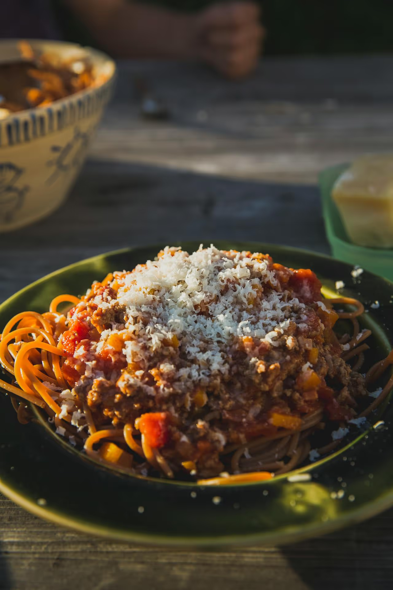 Image of a plate of pasta with cheese.